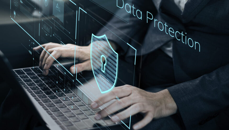 AI Phishing Detection-User-typing-with-digital-data-protection-interface-overlay