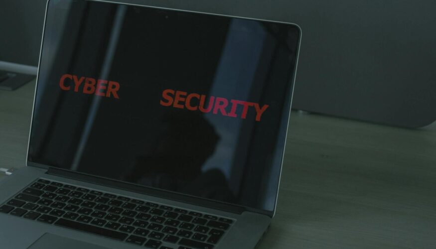 Network Security Threats - Laptop screen showing Cyber Security