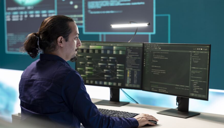 Man at the computer - The Future of Cybersecurity: What Businesses Need to Know