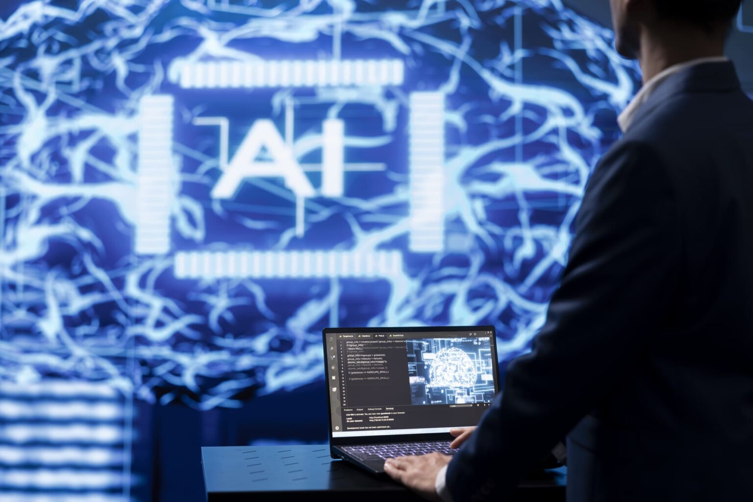 Man using AI software on laptop with digital background - Cybersecurity AI