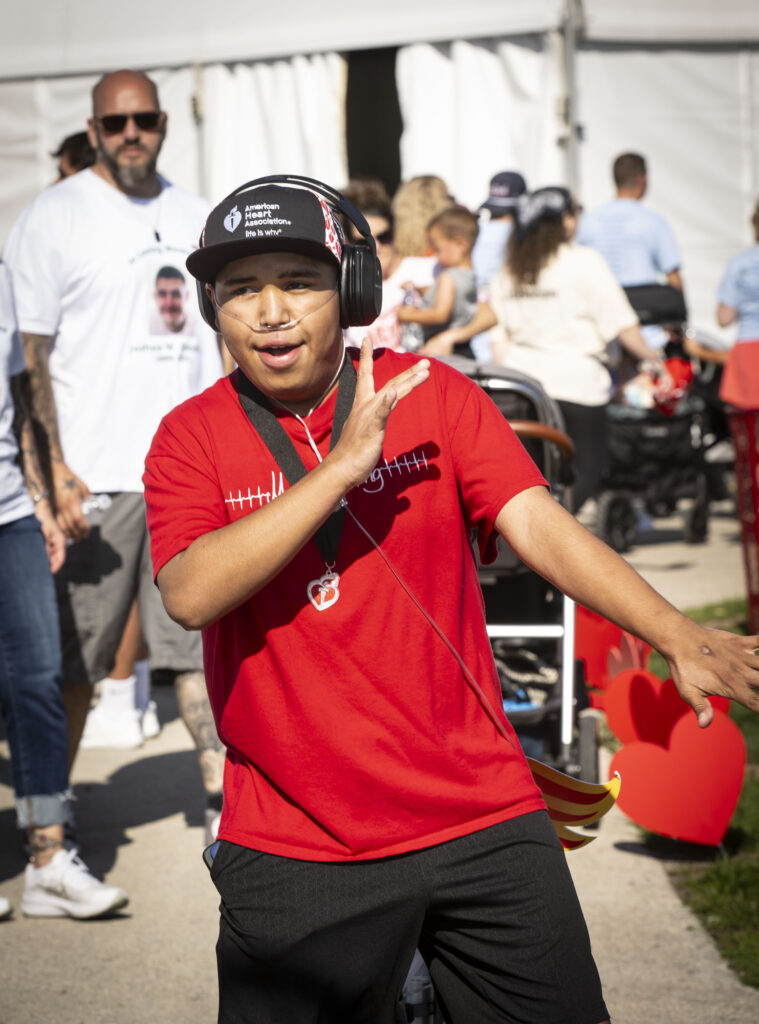 Manny Rios posing after the Milwaukee American Heart Association’s Southeastern Wisconsin Heart and Stroke Walk Henry Maier Festival Park. 
