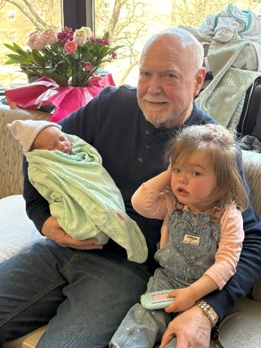 Gregg Guttormsen with granddaughters Carmen and Mia
