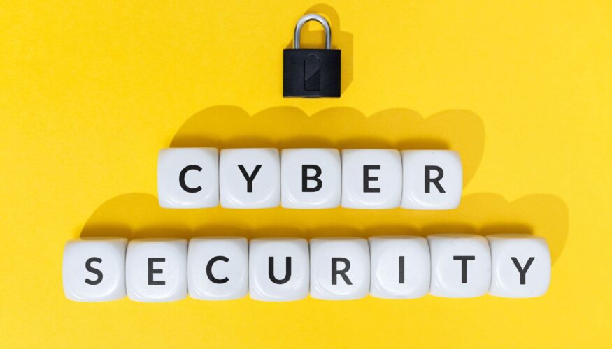 CMIT White-blocks-spelling Cyber Security with-a-padlock-on-yellow-background