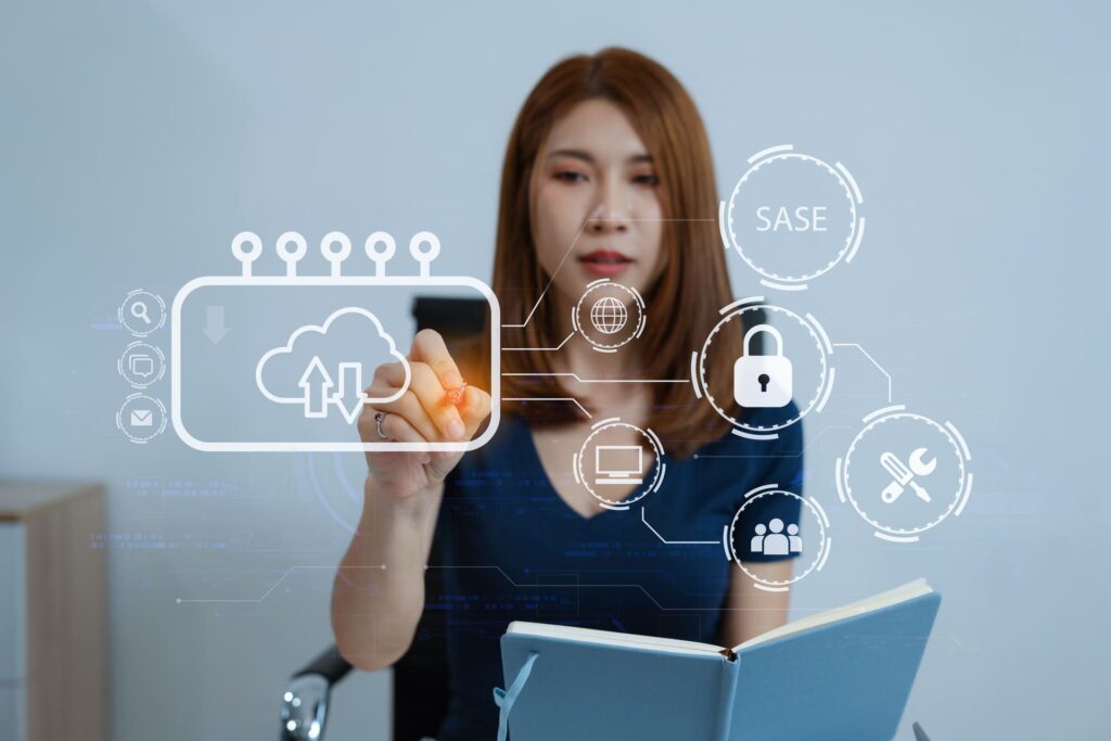 Woman-using-a-digital-interface-with-cloud-security-and-SASE-icons CMIT Cybersecurity Social Engineering
