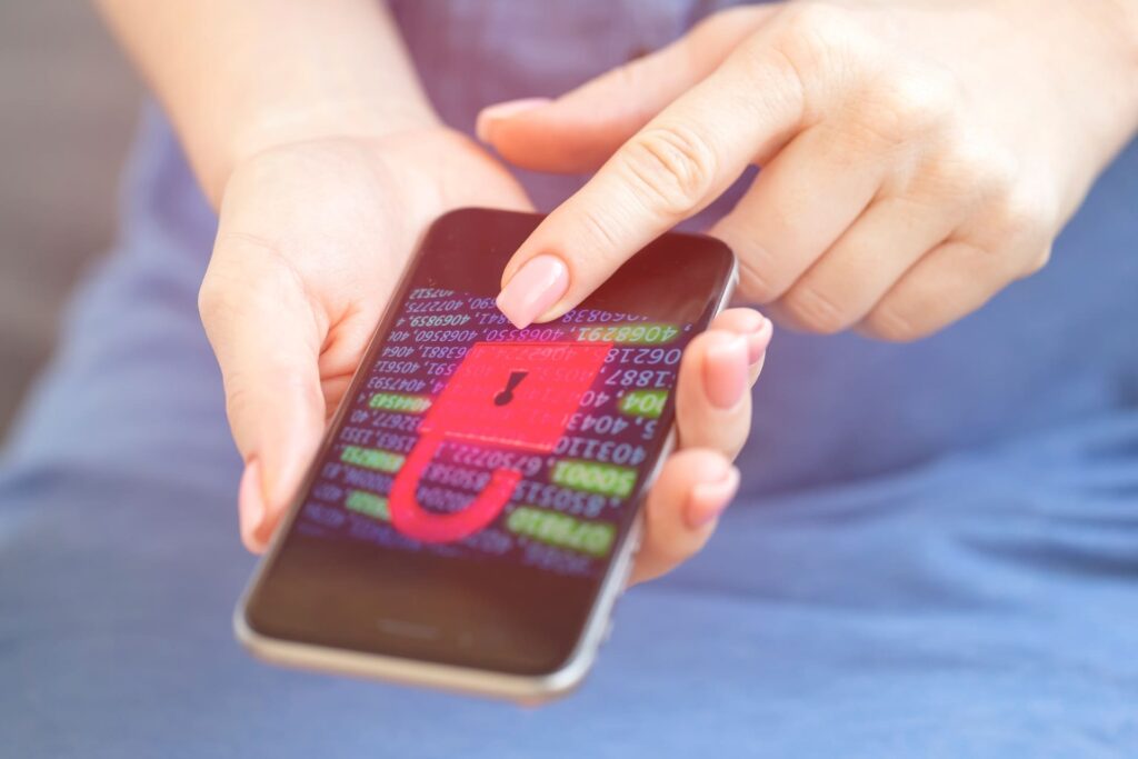 Pretexting in Cyber Security - Smartphone-showing-a-digital-padlock-and-encrypted-data-on-screen