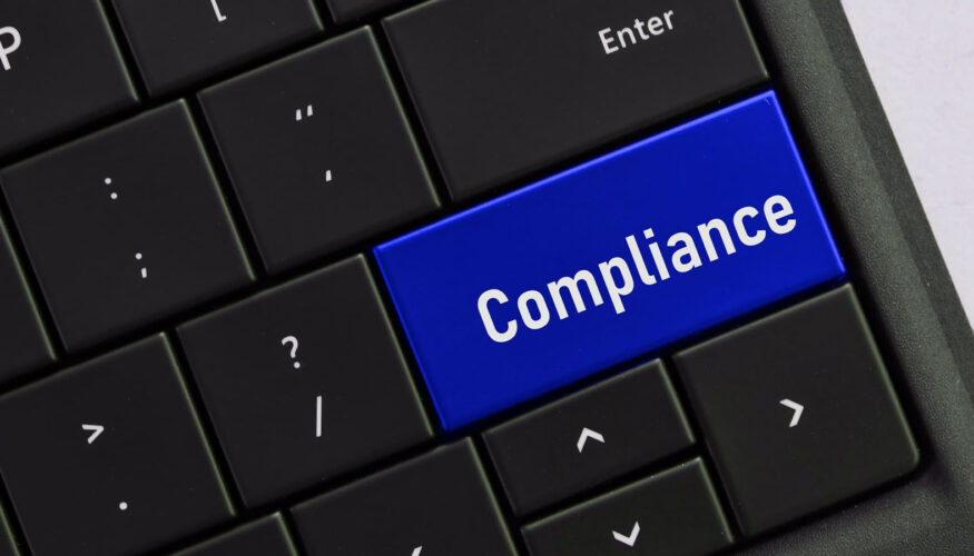 computer-keyboard-with-a-compliance-button-concept - IT Compliance Requirements