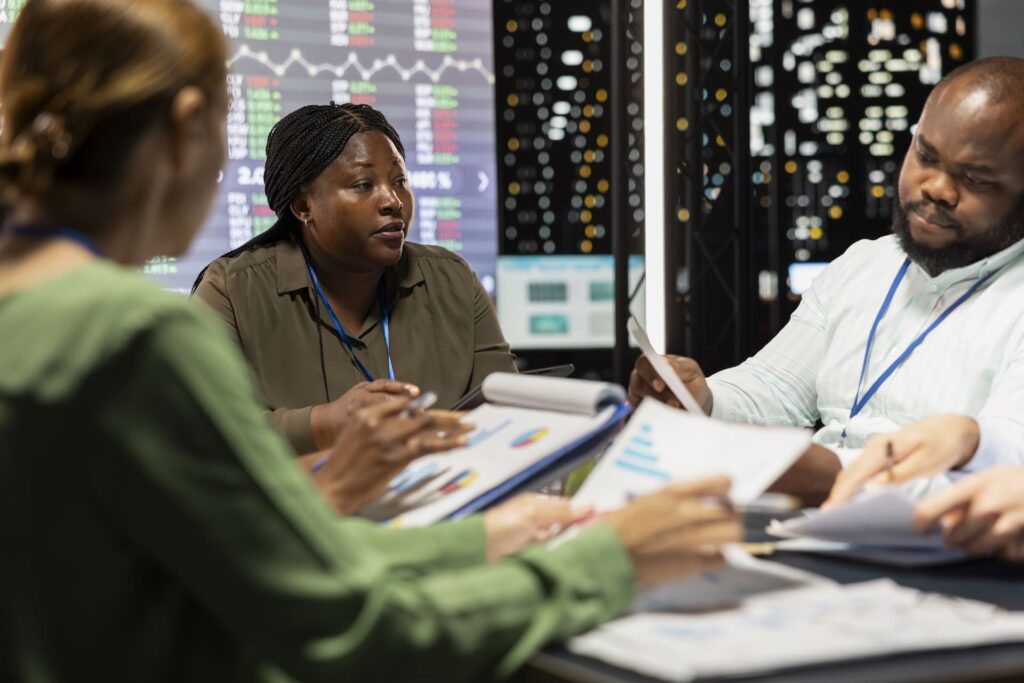 Team-reviewing-financial-reports What Is Data Compliance? Data Security 101
